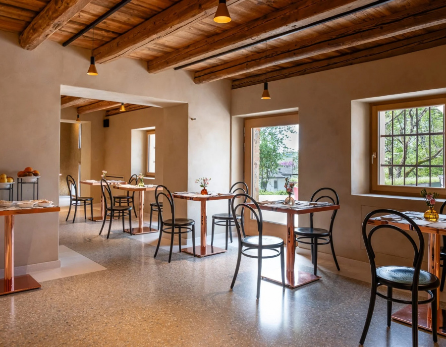 Decorative Terrazzoverlay XL flooring with a seamless finish for a hospitality project in Conegliano