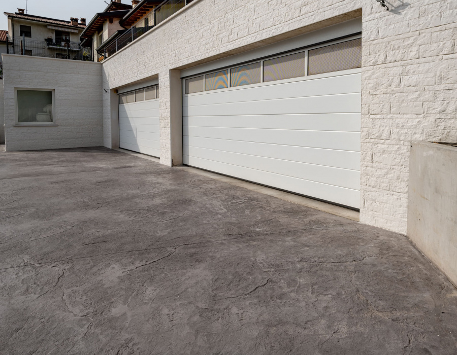 private villa with stamped concrete and wall